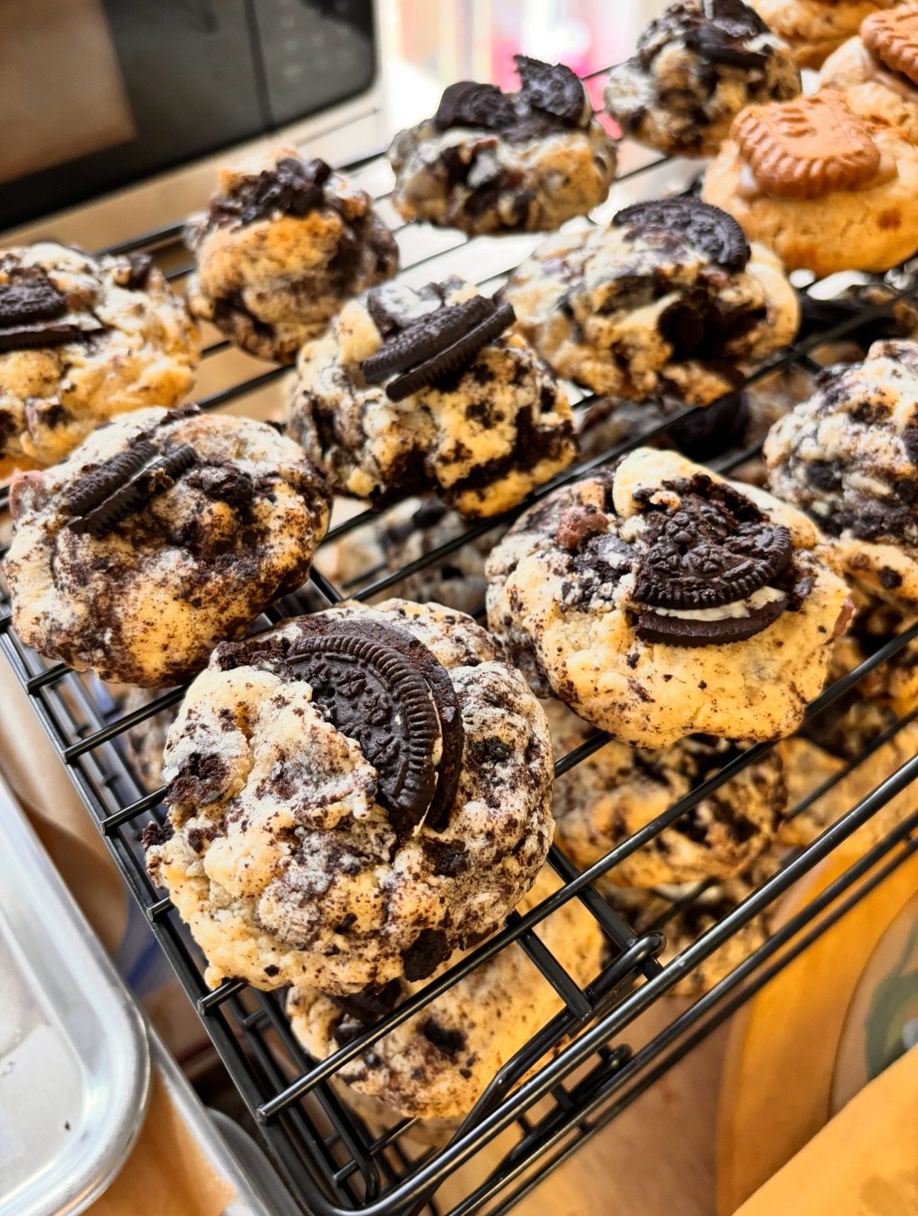 Cookies and cream cookies topped with an Oreo cookie