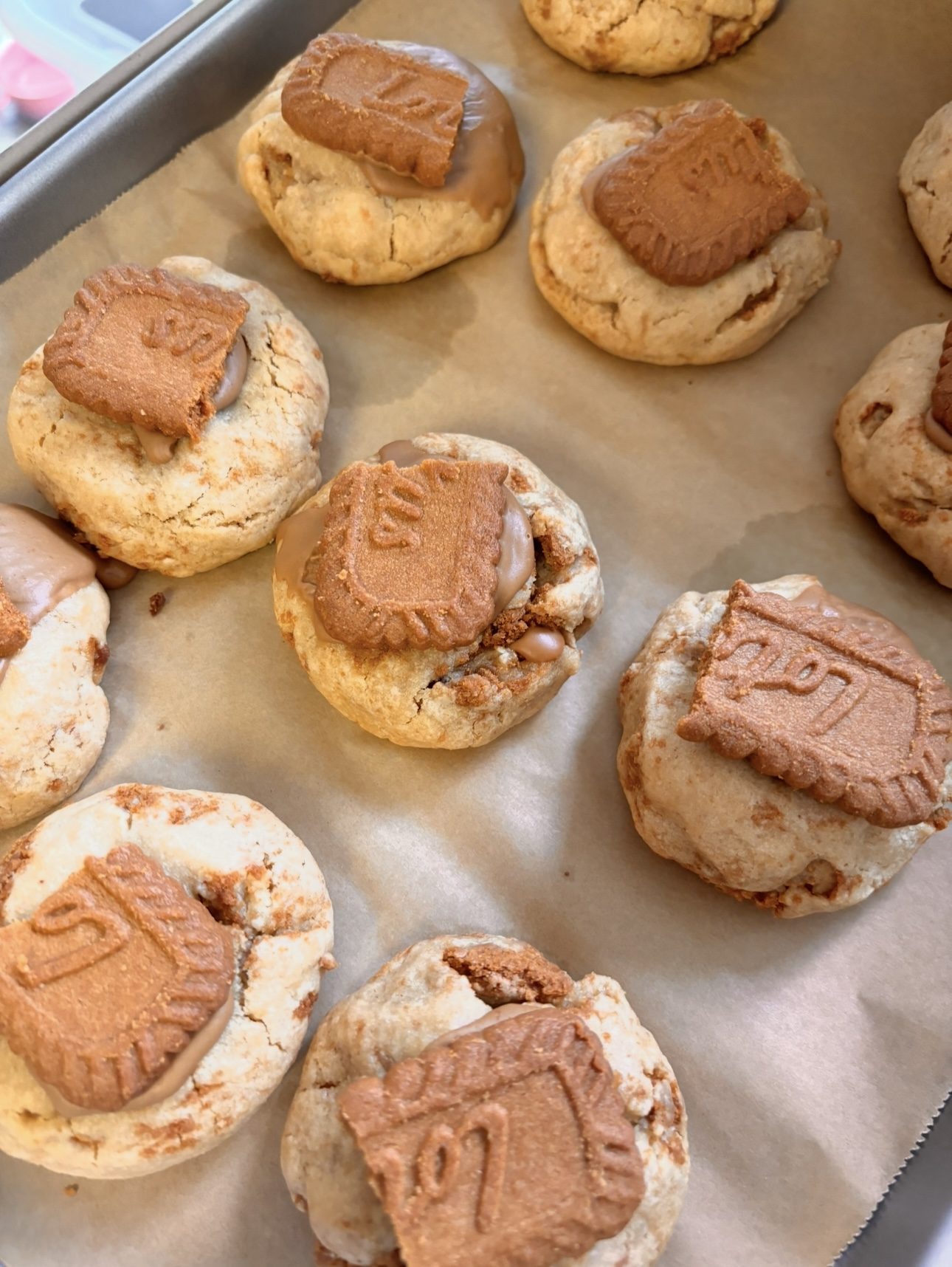 Cookies topped with Biscoff Lotus cookies and caramel drizzle