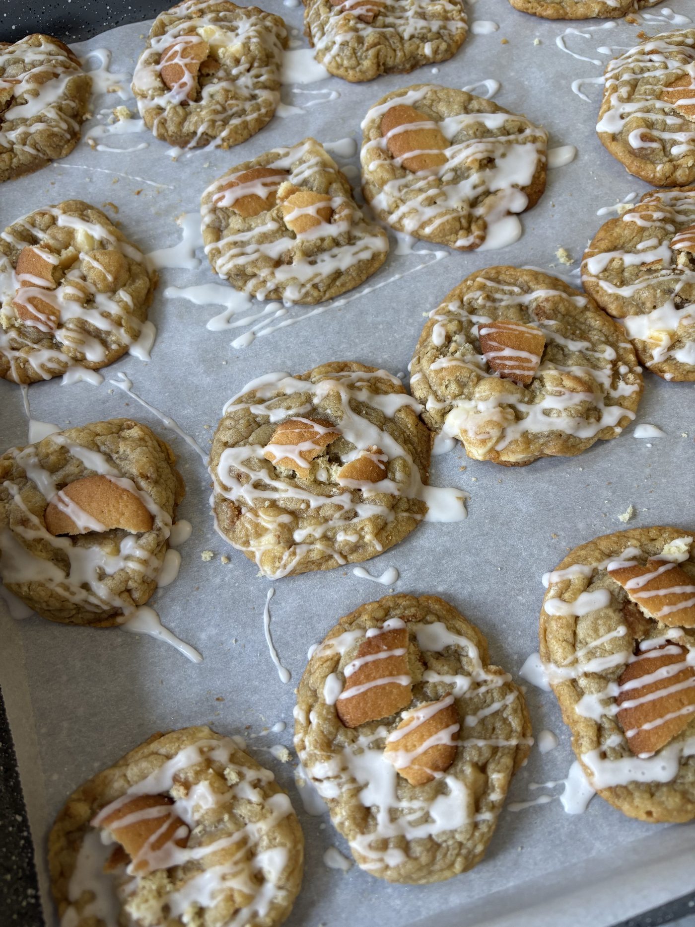 Banana pudding cookies with Nilla wafers and a vanilla drizzle